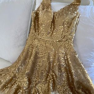 Shine bright this Holiday Season! Gorgeous New Gold Sequence Dress